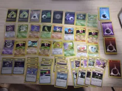 Lot of 90 Vintage WOTC Pokemon Cards with Sleeves - Image 1
