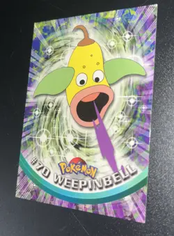 1999 Topps Pokemon TV Animation Series 1 Weepinbell Green Logo #70 - Image 1