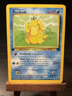 1st Edition Psyduck Pokemon TCG Team Rocket 65/82 Vintage WOTC Card NM - Image 1