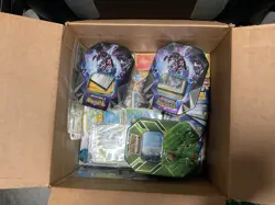 Pokemon Card Lot in Tins and Sleeves - Image 1