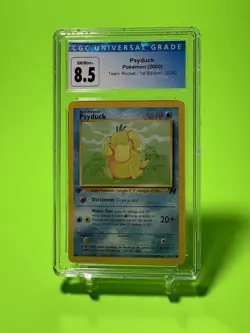 CGC 8.5 Psyduck 1st Edition Team Rocket 65/82 Pokemon Near Mint/Mint - Image 1