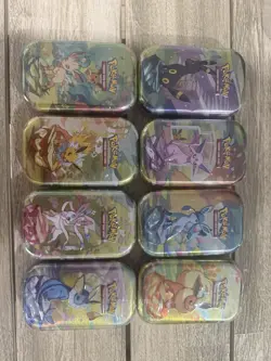 Pokemon Prismatic Evolutions Mini Tins (Complete Set of 8) - SEALED - Image 1