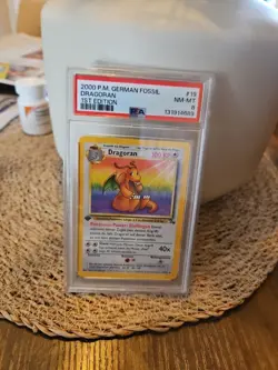 Dragonite Fossil 1st Edition #4/62 – Englisch, PSA 8 NM, Pokemon Dragoran - Image 1