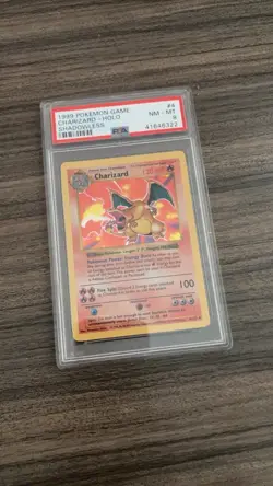 1999 Pokemon Game Charizard Holo Shadowless PSA 8 NM-MT - Image 1