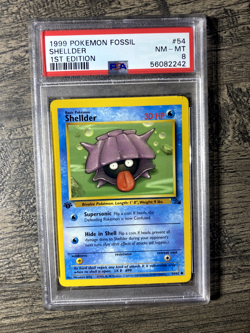 1999 Pokemon Fossil 1st Edition Shellder PSA 8 - Image 1