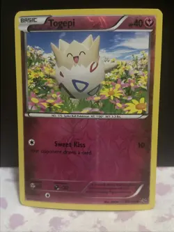 Togepi 43/108 LP Reverse Holo Roaring Skies Discontinued Fairy Type Pokemon Card - Image 1