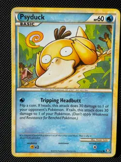 PSYDUCK 74/102 C HGSS TRIUMPHANT POKEMON NM/M - Image 1