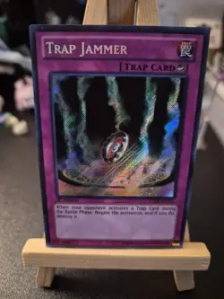 Yugioh LCJW-EN111 TRAP JAMMER Secret Rare 1st Edition (NM) - Image 1
