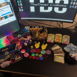 Lot Of Official Pokemon Coins + 71 code cards + keychains & 8 Empty Tins - Image 1