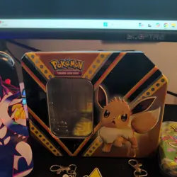 Lot Of Official Pokemon Coins + 71 code cards + keychains & 8 Empty Tins - Image 4