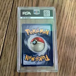 1999 Pokemon Charizard #4 Base Set Holo PSA 7 - Image 2