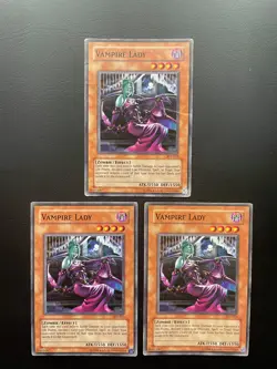 Yugioh Vampire Lady AST-013 Unlimited Edition Common Damaged X3 - Image 1