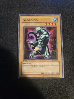 Gagagigo - DCR-054 - Common - 1st Edition x1 - Lightly Played - Image 1