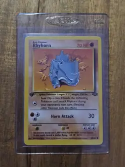 Rhyhorn 1st Edition - NEAR MINT- #61/64 - Jungle Set 1999 - Pokemon Card WoTC - Image 1