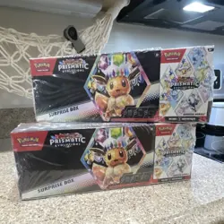 Pokemon Prismatic Evolutions Surprise Booster Bundle Eevee 4 Boxes Total - Image 1