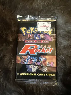 Pokemon WOC06174 TCG Team Rocket Booster Pack - 11 Cards 742818061766 - Image 1