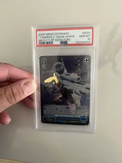 WEISS SCHWARZ GODDESS OF VICTORY: NIKKE #E091 "7 DWRVS: I" SNOW WHITE PSA 10 - Image 1