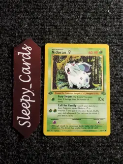NIDORAN Pokemon 1st Edition Jungle 57/64 WOTC 1999 NM - Image 1