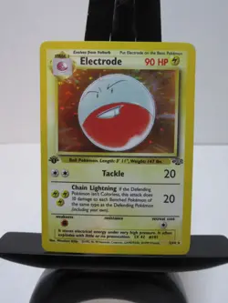 Electrode 1st Edition Holo Rare Jungle 2/64 Pokemon TCG Card- MP Condition - Image 1