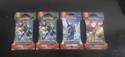 4 sleeved booster packs of pokemon burning shadows - Image 1