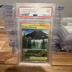2024 POKEMON SV08 SURGING SPARKS GRAVITY MOUNTAIN HYPER RARE HOLO #250 PSA 9 - Image 1