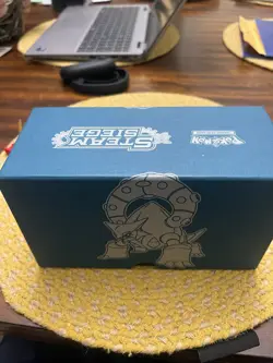 Pokemon Steam Siege Elite Trainer Box with many cards inside - Image 1