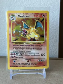 1999 POKEMON BASE SET UNLIMITED #4 CHARIZARD-HOLO NEAR MINT - Image 1