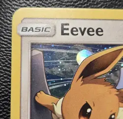 Pokemon TCG Eevee SM235 2019 Sun & Moon Cosmos Holo Black Star Promo Card - MP - Image 3