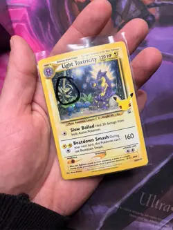 Light Toxtricity SWSH137 Promo Cosmos HD Galaxy Mew Tail Swirl Pokemon NM - Image 1