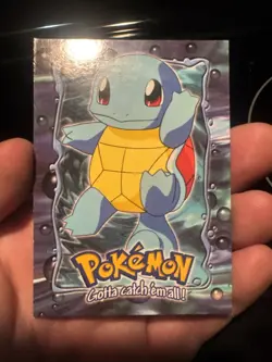 1999 Topps Pokemon Squirtle #E7 of 12 Stage 1 Movie Edition Blue Topps Logo - Image 1