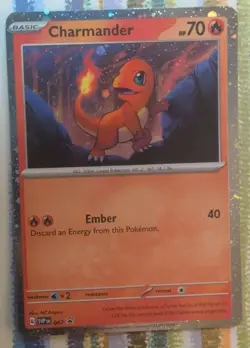 Charmander SVP Cosmos Holo Promo 047 Pokemon Card - Image 1