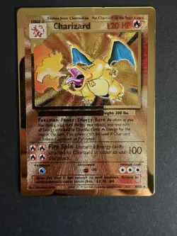 Pokemon TCG Charizard 4/102 Celebrations Gold Metal Card - Image 1