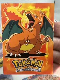 1999 Topps Pokemon the First Movie E6 #06 Charizard Blue Logo - Image 1