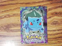 01 Bulbasaur E1 of 12 TOPPS Pokemon Evolution Card - Textured Dots Foil - Image 1