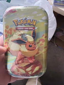 pokemon prismatic evolutions mini tin Flareon New Sealed 2 Packs Of prismatic - Image 1