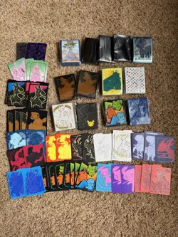 Pokemon Card Sleeves and Dividers Lot - Image 1