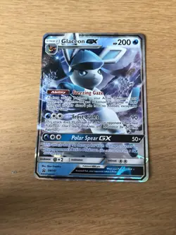 POKEMON BLACK STAR PROMO GLACEON GX HALF ART NEAR MINT SM147 - Image 1