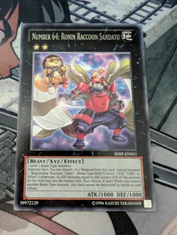 Number 64: Robin Raccoon Sandayu Yu-Gi-Oh! TCG SHSP-EN051 - Image 1