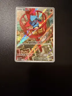 Pokemon TCG Riolu 010 Mega Evolution Black Star Promo Holo Card - Image 1