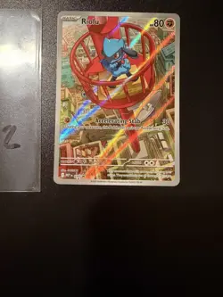 Pokemon TCG Riolu 010 Mega Evolution Black Star Promo Holo Card - Image 1