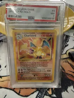 1999 POKEMON BASE SET UNLIMITED #4 CHARIZARD-HOLO PSA 7 - Damaged Slab - Image 1