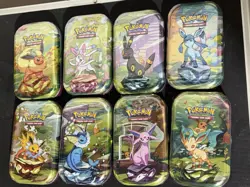 Pokemon TCG Prismatic Evolutions Mini Tin Complete Set - 8 Factory Sealed Tins - Image 1