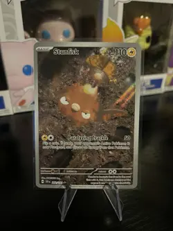 Stunfisk 202/191 Illustration Rare Surging Sparks Pokemon NM - Image 1