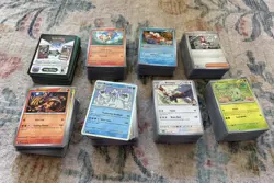 700+ Unsearched Pokemon Card Bulk with Empty Mega Charizard Box & Accesories - Image 1