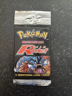 Pokemon WOC06176 TCG Team Rocket Booster Pack - 11 Cards 21 Grams. SEALED PACK 742818061766 - Image 1