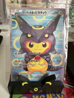 Pokemon Poncho Pikachu Oversized Lenticular Card - Umbreon/Rayquaza - Image 1
