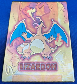 Pokemon Vintage 1999 Japanese Meiji Embossed Foil Promo Card CHARIZARD /LIZARDON - Image 1