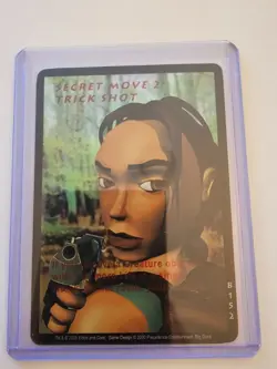 Tomb Raider CCG B152 - Secret Move 2: Trick Shot - Big Guns Ultra Rare Card Holo - Image 1