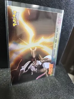 1999 Topps Pokemon Movie # 7 Trying Out The New Toy Foil Blue Label - Image 1