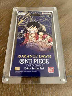 One Piece Romance Dawn Sleeved Booster Pack With Acrylic Case - Image 1